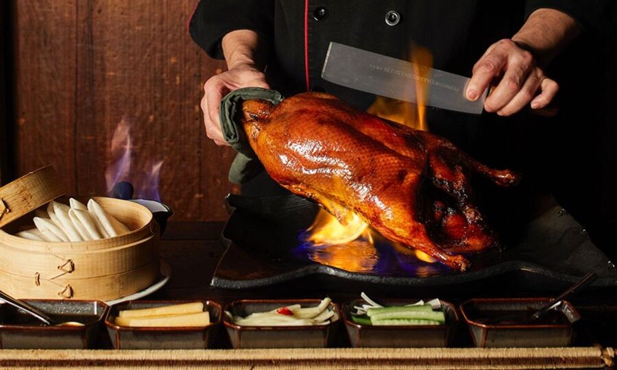 Beijing: Acrobatic Show with Peking Duck Dinner Private Tour - Peking duck dinner at a local restaurant, and why the guide matters