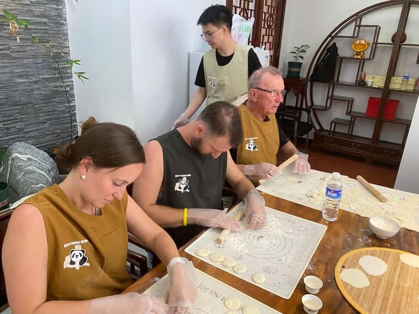 Beijing: Dumpling Making Workshop with Meal and Tea - Tea pairing, beer, and extra dishes that make the meal feel like a feast