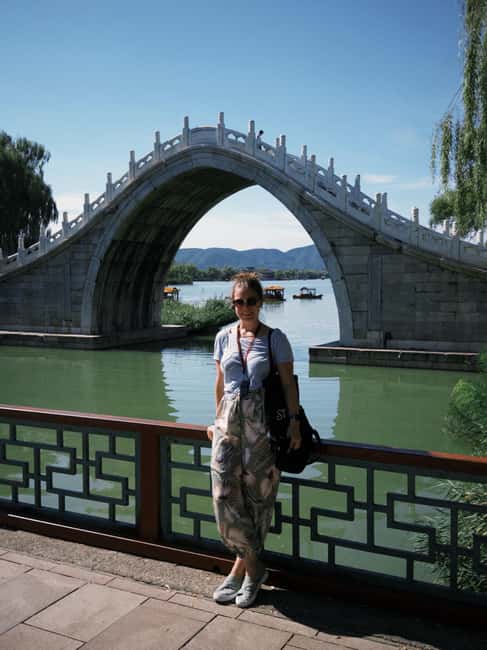 Beijing: Summer Palace 3 Hours Guided Tour with Entry Ticket - Entering a UNESCO World Heritage Site with a Guide in Front of You