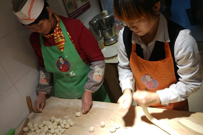 Private Hutong Culture Tour with Dumpling Cooking Class plus Cricket Fighting Game - Drum Tower viewpoints and the walk to Houhai