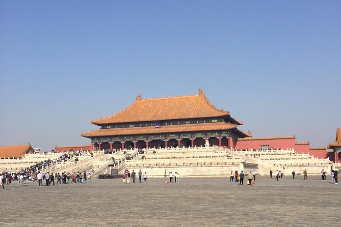 Small-Group Coach Tour: City Highlights of Beijing Including Lunch - Starting at 7:00 AM: pickup, coach ride, and Tiananmen Square orientation